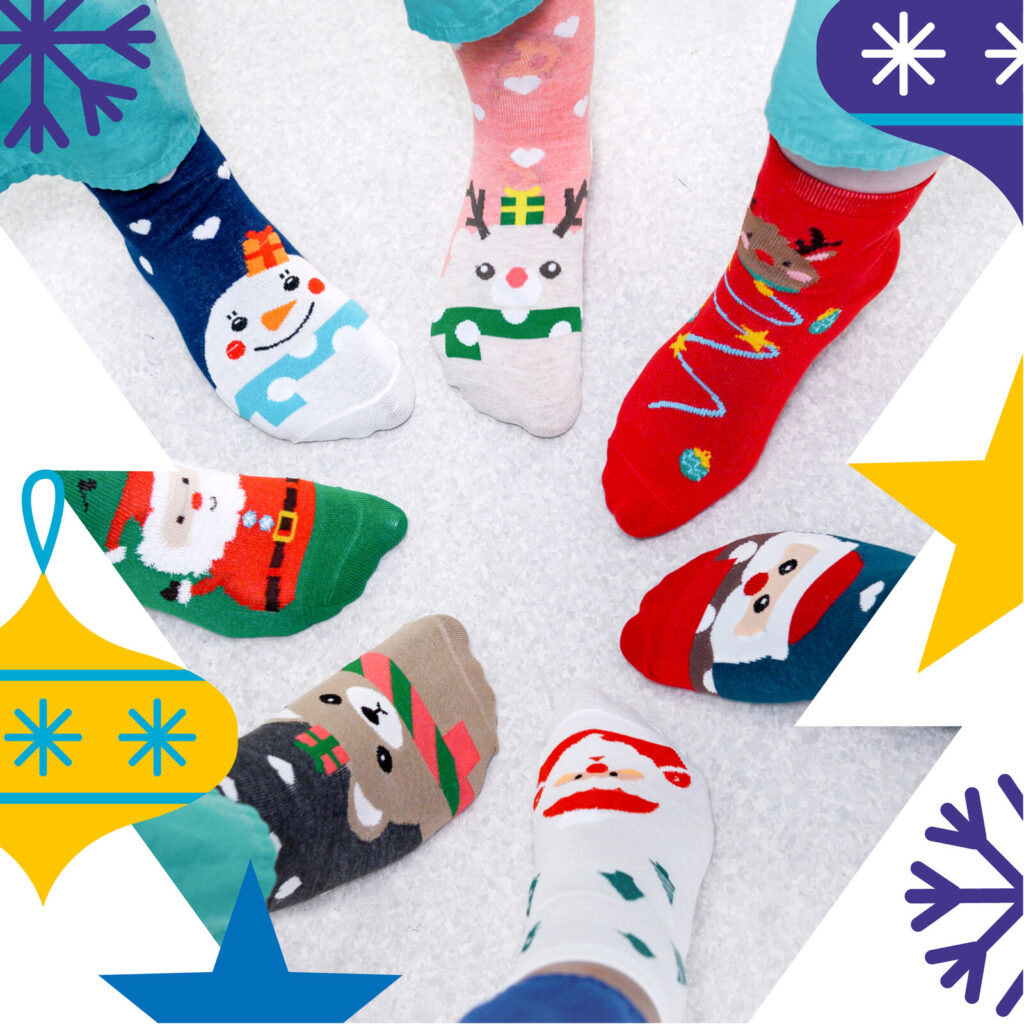 feet wearing Christmas socks